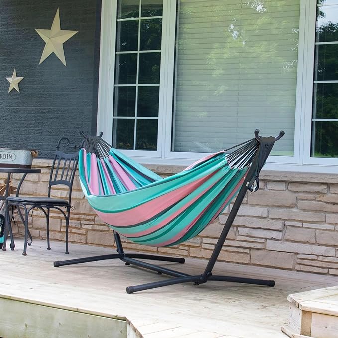 Vivere Double Cotton Hammock with Space Saving Steel Stand, Upgraded Polyester End Strings 450 lb Capacity - Premium Carry Bag Included - USA Grown Cotton (Watermelon)